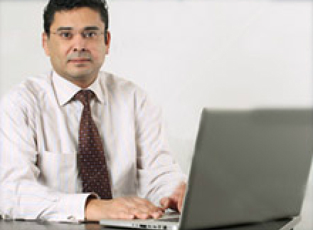 Picture of man at computer